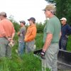 01-workers listen to instruction from tim at upstream meadow site